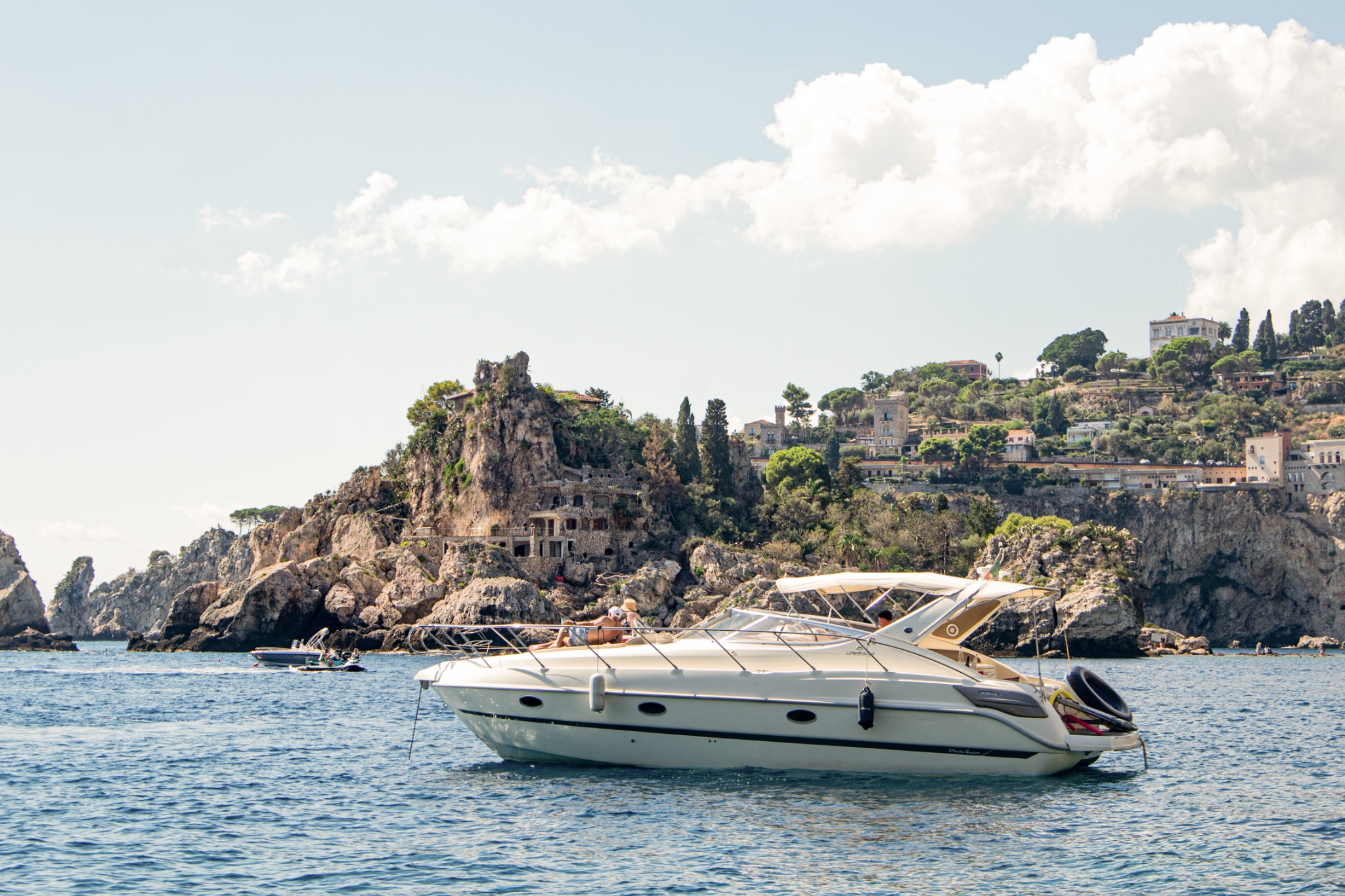 Cranchi 34 beside the Taormina coast