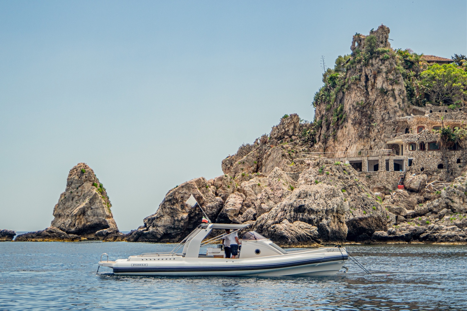 Stilmar 35 Cabin beside the rocky coast of Isola Bella, Taormina